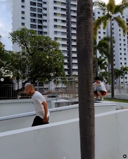 Rusyd and kin doing a parkour flow at clementi parkour spot